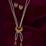 A Sirkar Replica with Diamond Frosting work Meenakari 2 Line Pearl Tie Chain with Earrings Set
