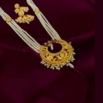 A Sirkar Replica with Diamond Frosting Work Floral and Hati Mukh Motif Meenakari Pearl Long Har